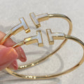 TIFFANY T BRACELET 1.8MM MOP GOLD