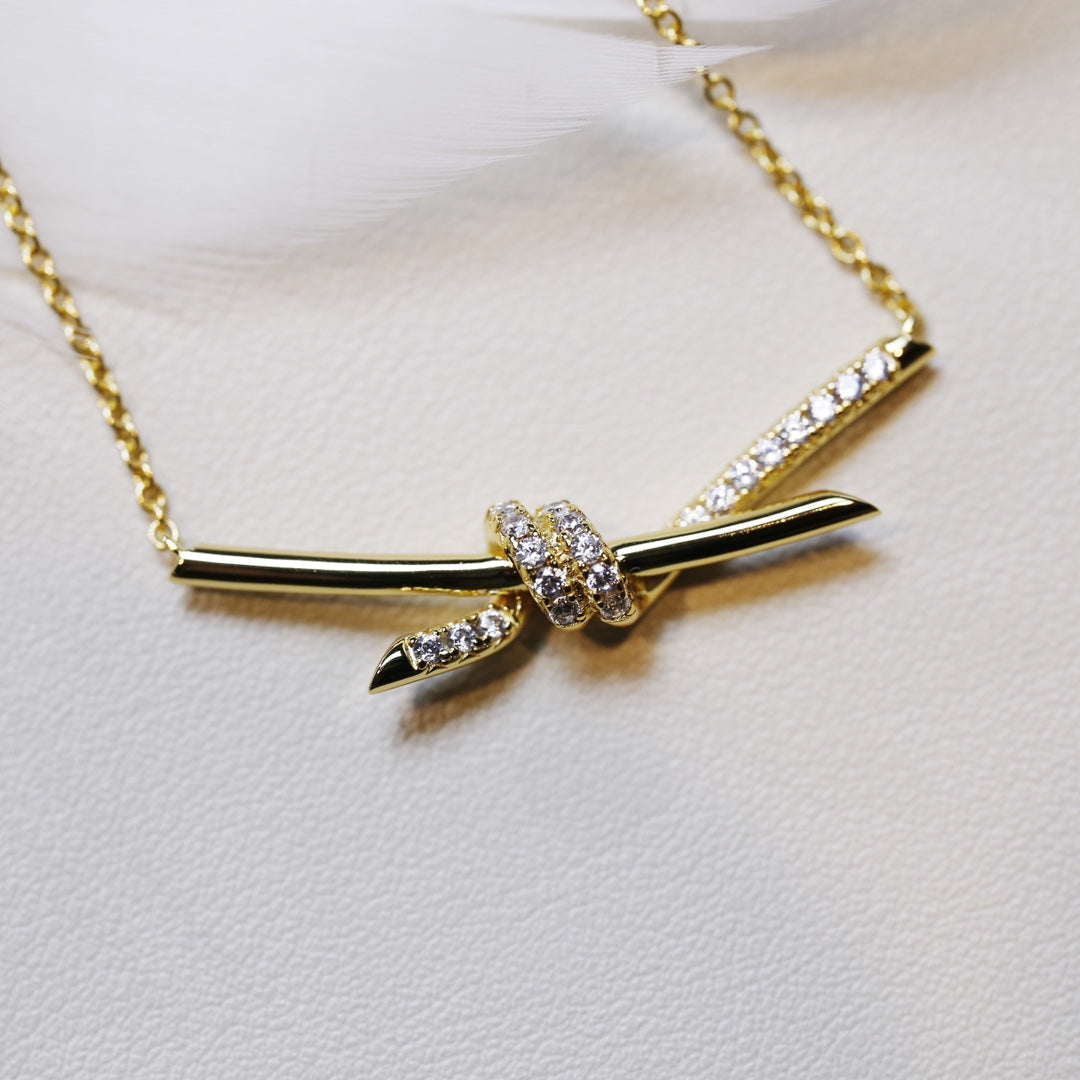 TIFFANY KNOT NECKLACE GOLD DIAMONDS