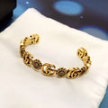 GUCCI MOTIF GOLD CUFF BRACELET