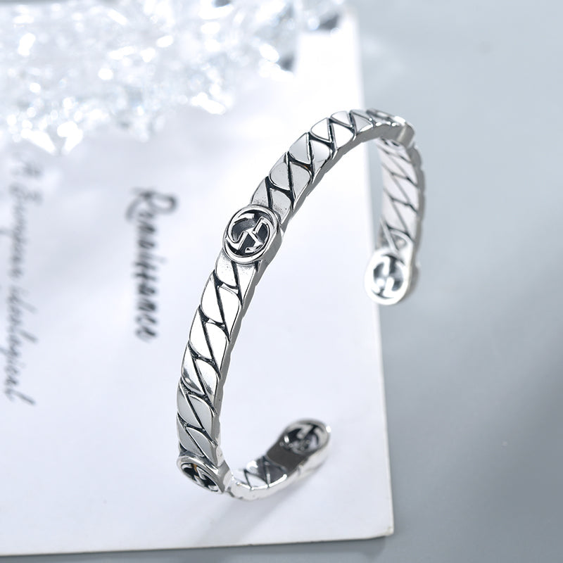 GUCCI SILVER INTERLOCKING OPEN BRACELET