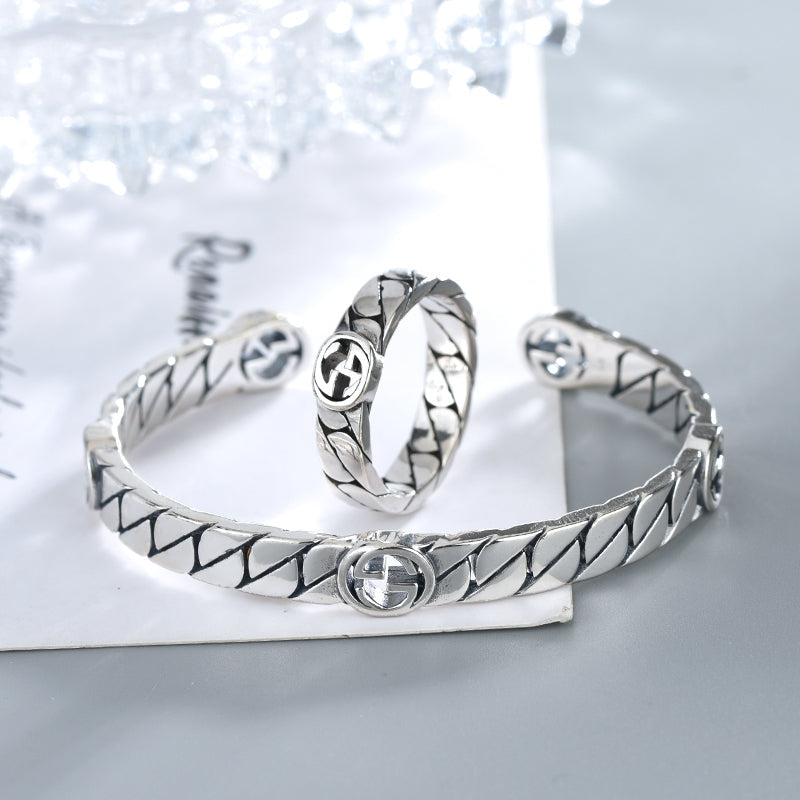 GUCCI SILVER INTERLOCKING OPEN BRACELET