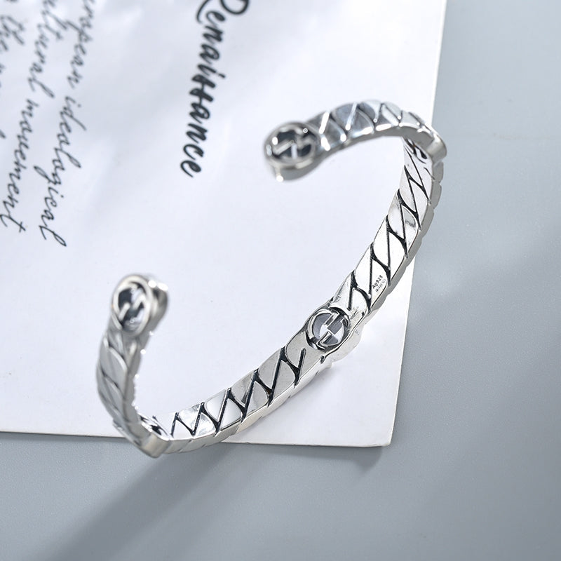 GUCCI SILVER INTERLOCKING OPEN BRACELET