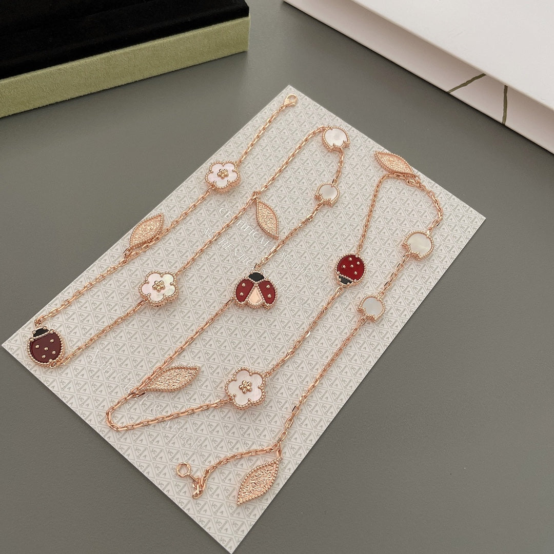 Van Cleef & Arpels LUCKY SPRING 15 MOTIFS PINK GOLD NECKLACE