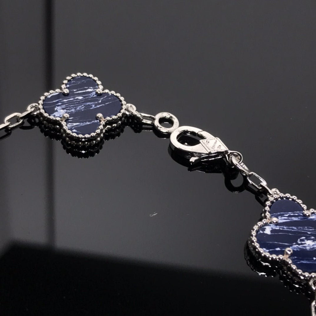 Van Cleef & Arpels CLOVER 5 MOTIF PIETERSITE SILVER BRACELET
