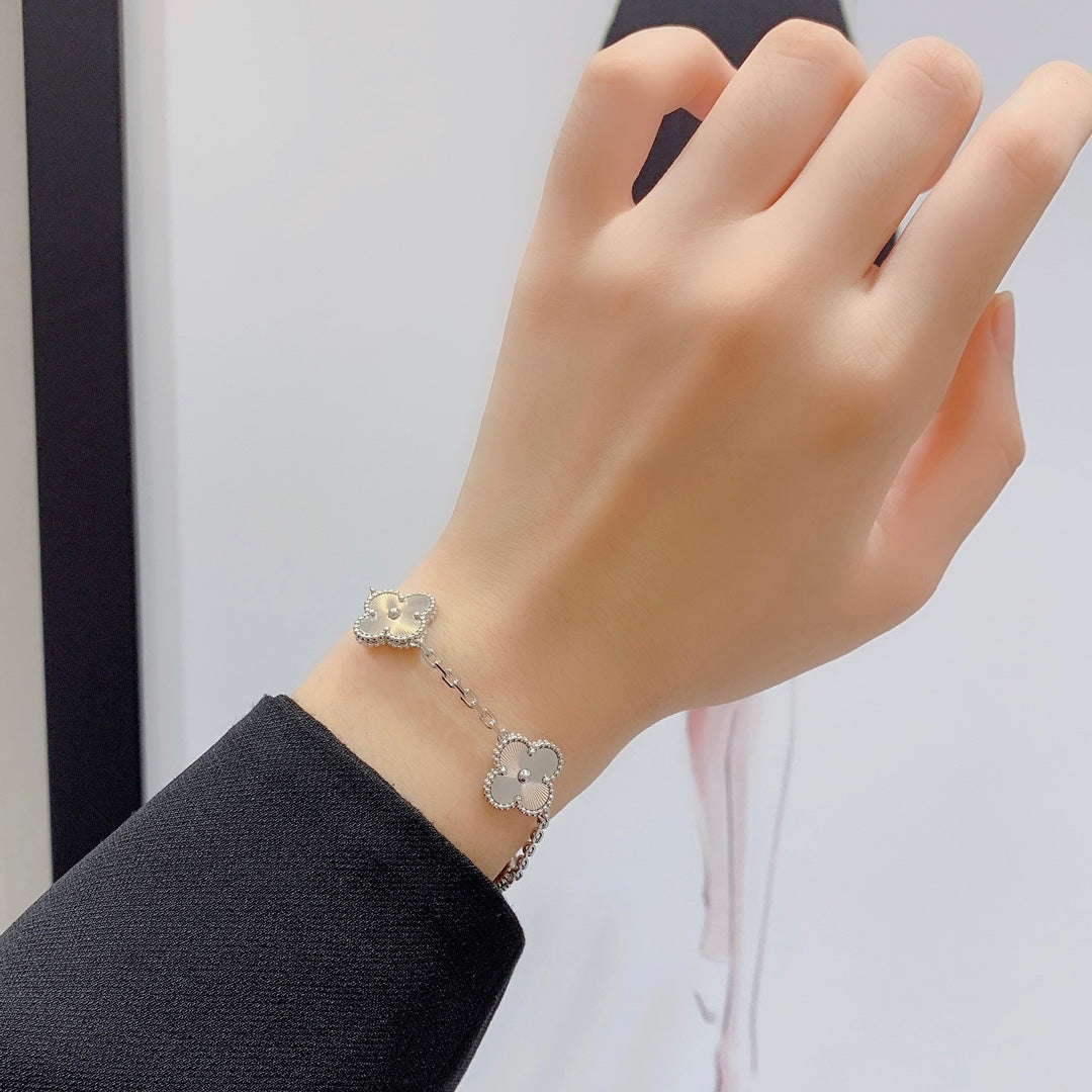 Van Cleef & Arpels CLOVER 5 MOTIF SILVER BRACELET