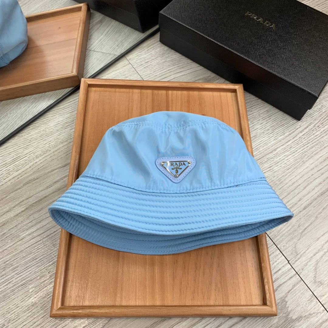 PRADA BUCKET HAT IN CERULEAN BLUE RE-NYLON 234101