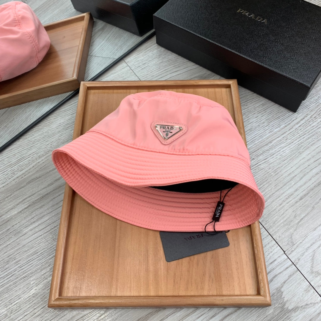 PRADA BUCKET HAT IN ROUGE PINK RE-NYLON 234103