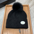 PRADA BEANIE HAT IN BLACK WOOL AND RABBIT FUR 346717