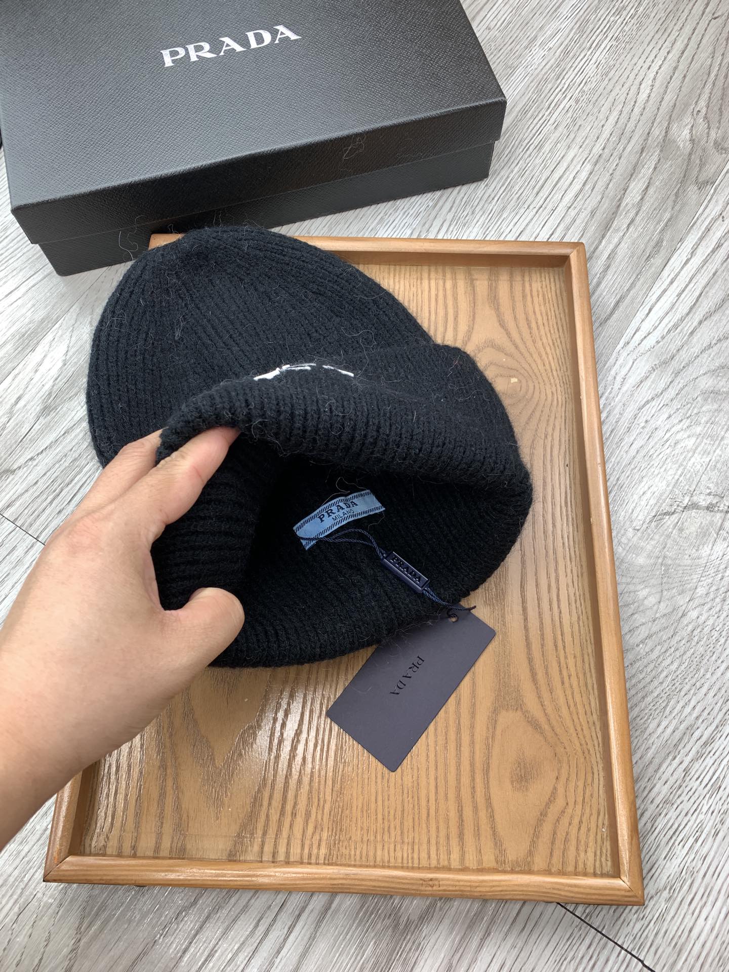 PRADA BEANIE HAT IN BLACK WOOL 108753