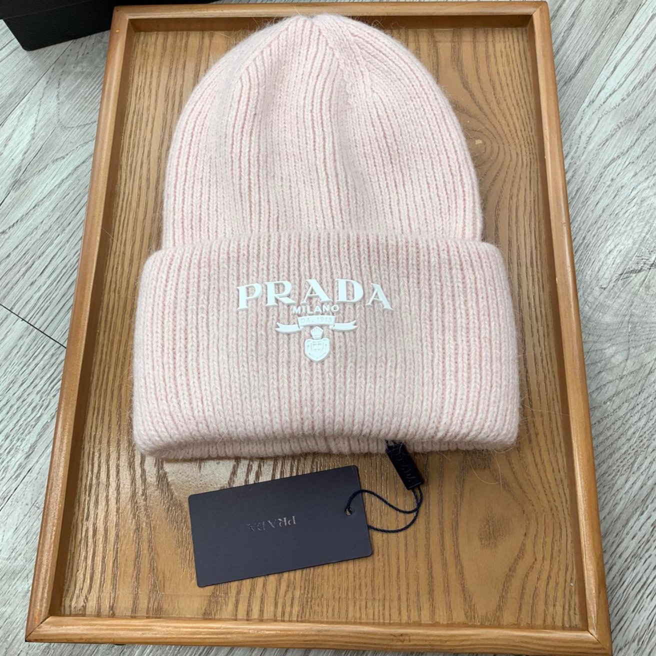 PRADA BEANIE HAT IN SOLF PINK WOOL 108751