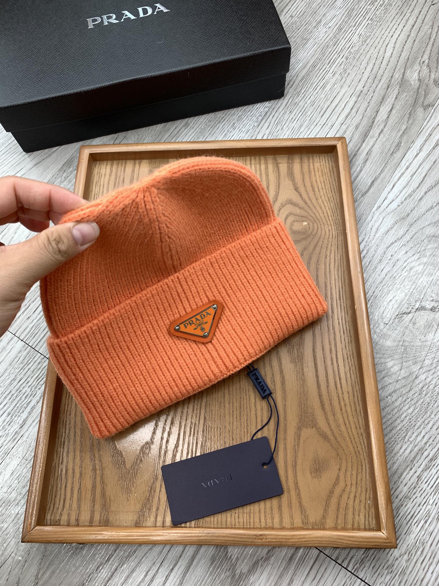 PRADA BEANIIE HAT IN CARROT ORANGE WOOL 335036