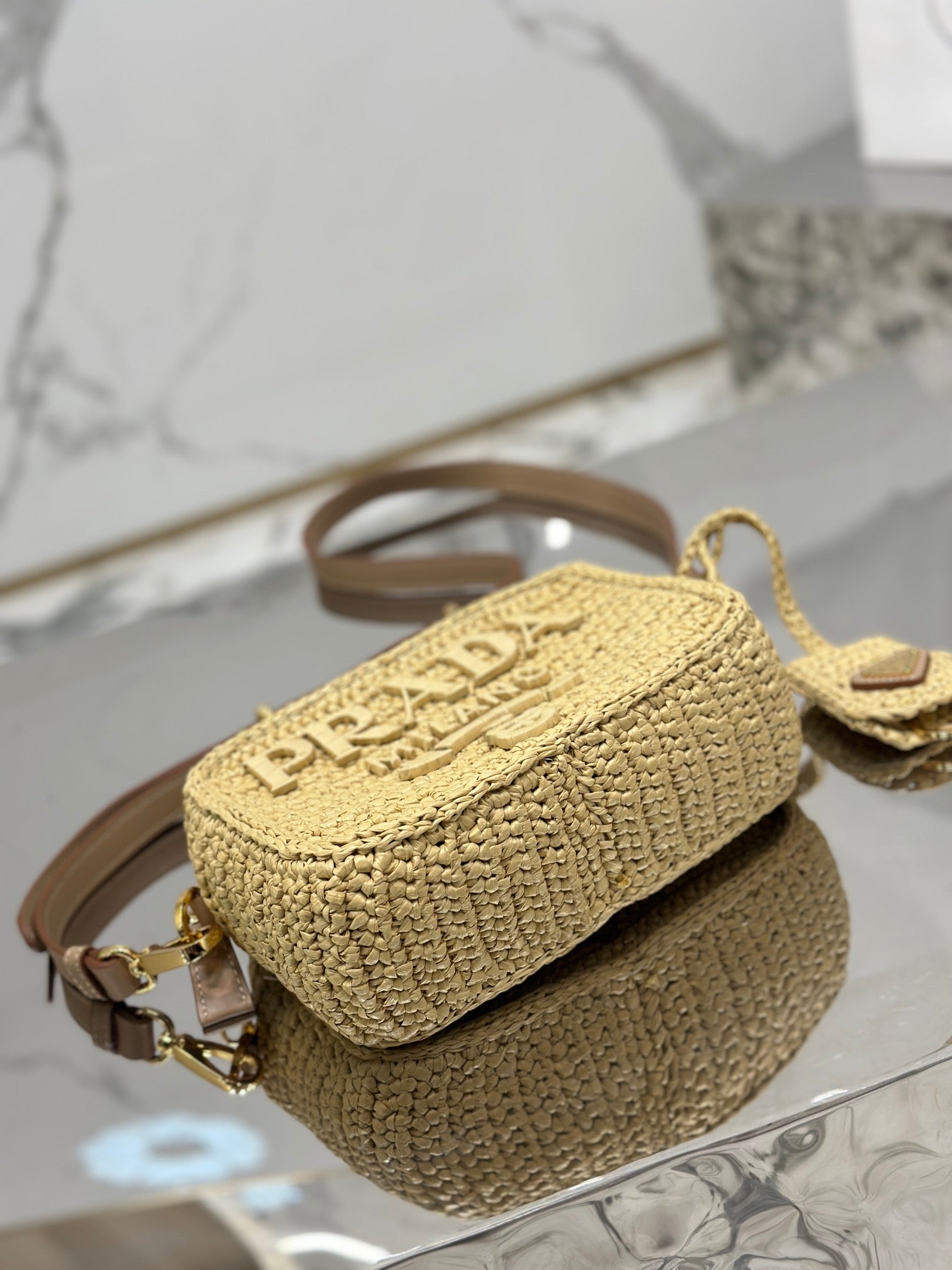 PRADA CAMERA BAG 20 IN BEIGE WOVEN RAFFIA