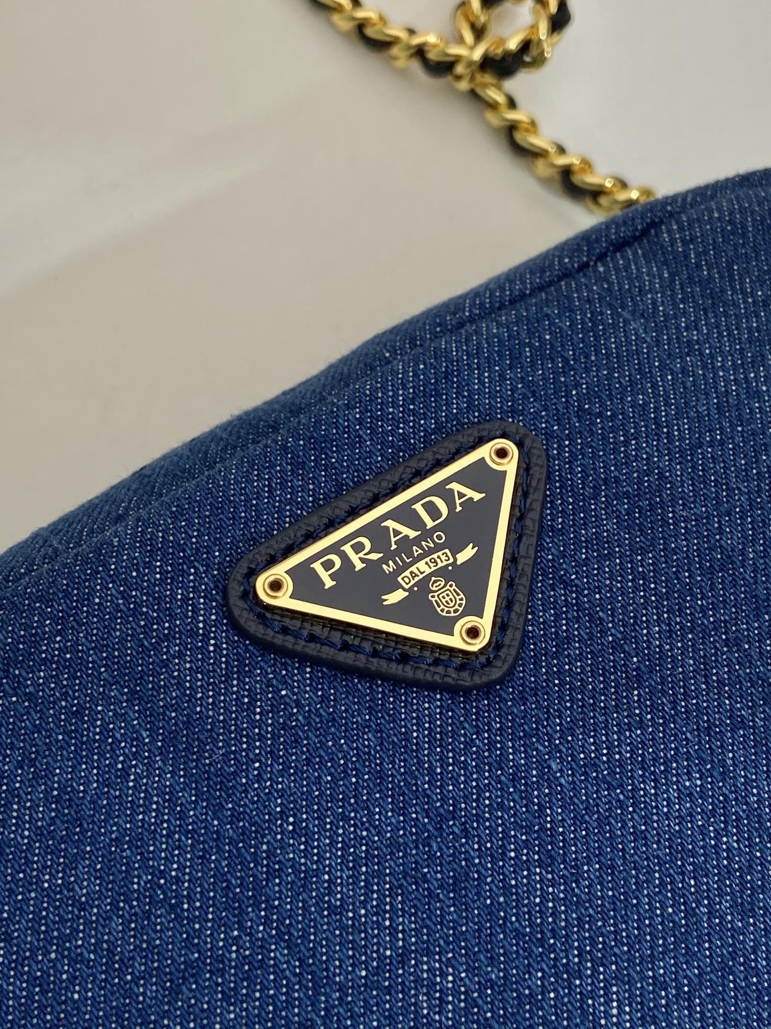 PRADA MINI BAG 14 IN AZURE BLUE DENIM GOLD HARDWARE