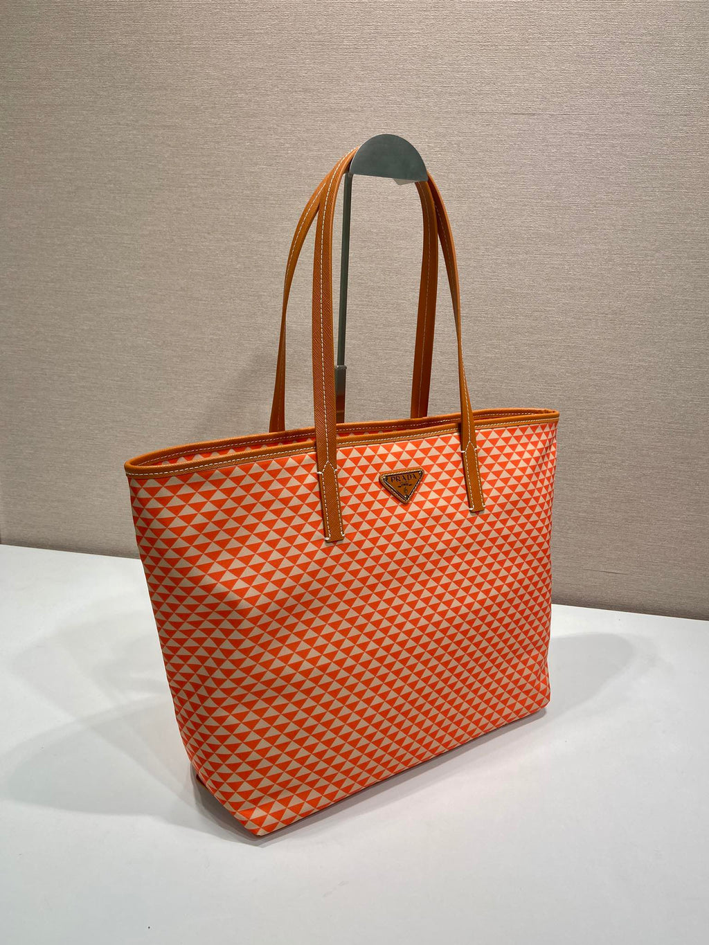 PRADA TOTE BAG 33 IN ORANGE MIX WHITE TRIANGLE PATTERN EMBROIDERED FABRIC
