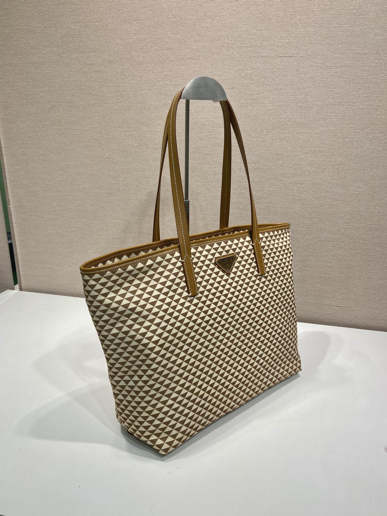 PRADA TOTE BAG 33 IN BROWN MIX CREAM TRIANGLE PATTERN EMBROIDERED FABRIC
