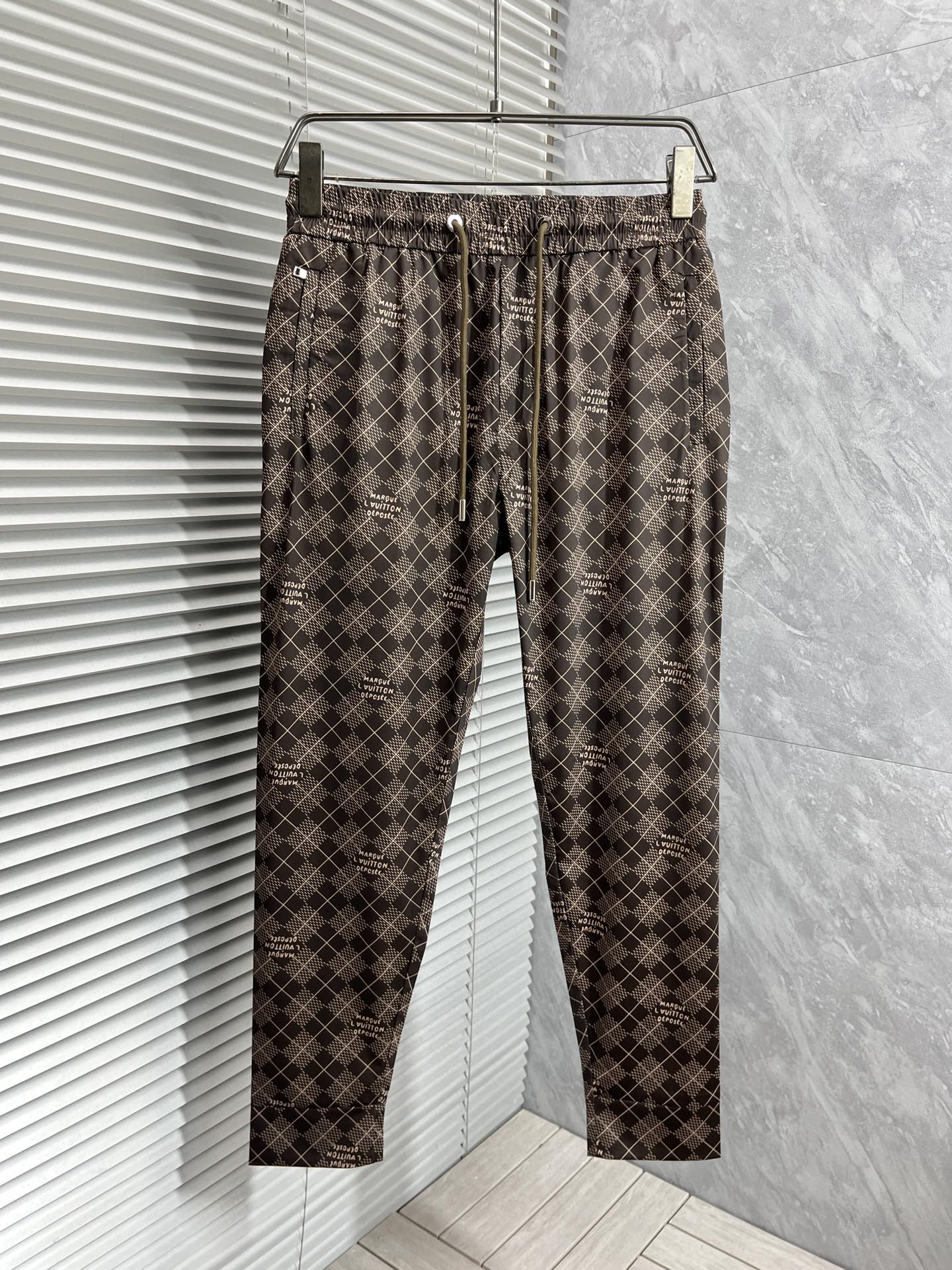 LOUIS VUITTON LV MEDIUM BROWN TROUSERS 239493