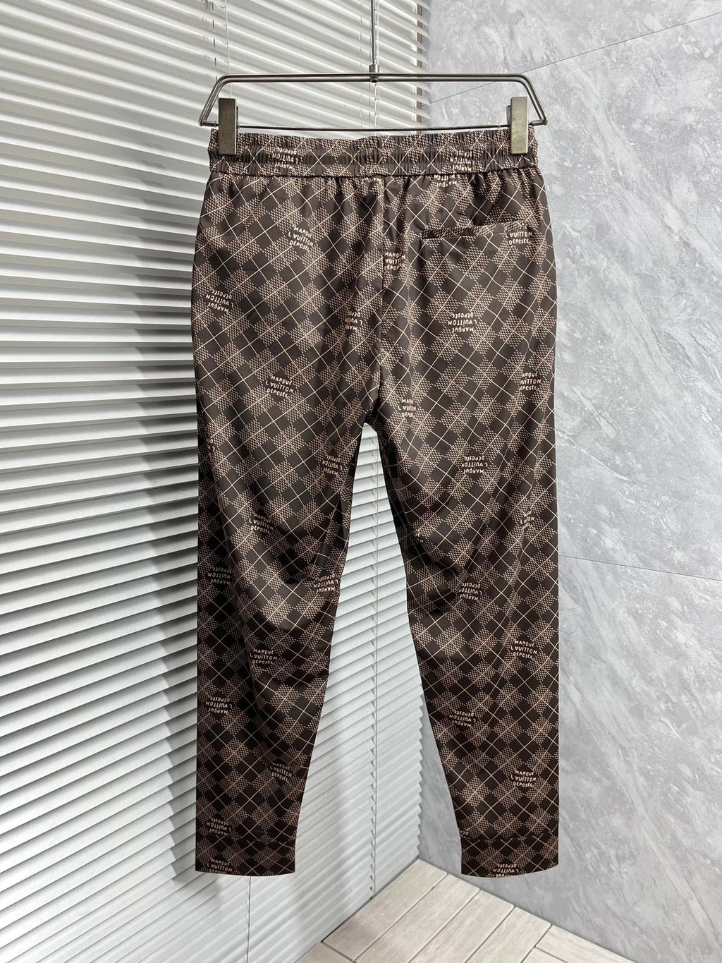 LOUIS VUITTON LV MEDIUM BROWN TROUSERS 239493
