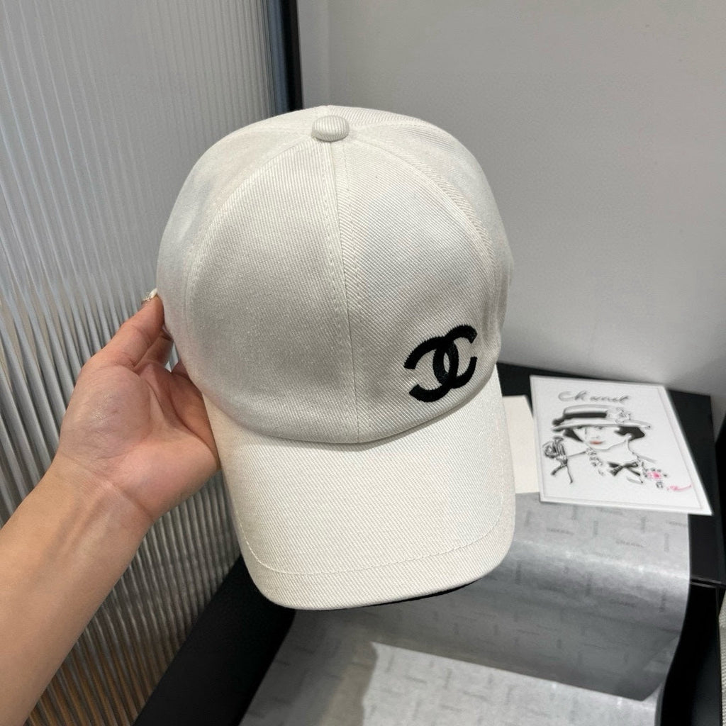 CHANEL BASEBALL HAT IN WHITE WITH BLACK TRIM 673994