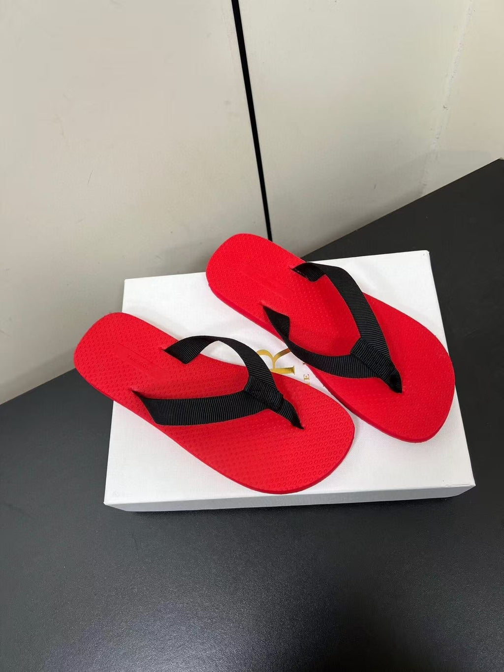 PRADA THE ROW THICK-SOLED FLIP FLOPS IN RED RUBBER