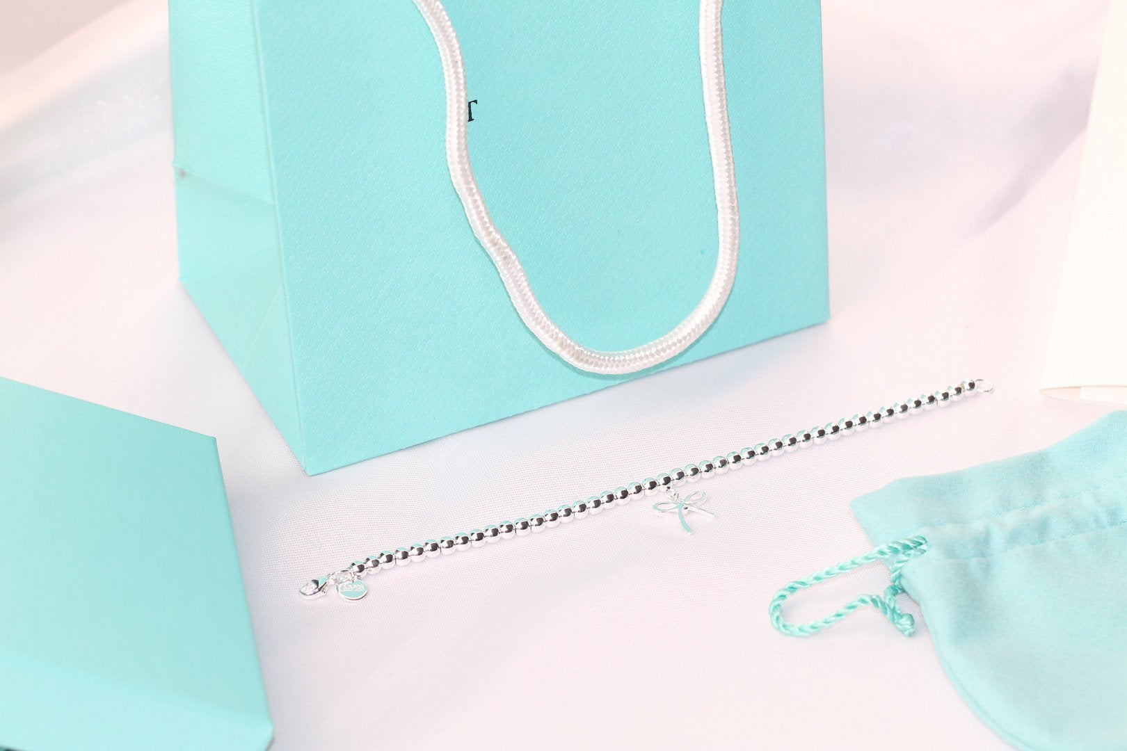 TIFFANY STERLING SILVER BOW BEAD BRACELET