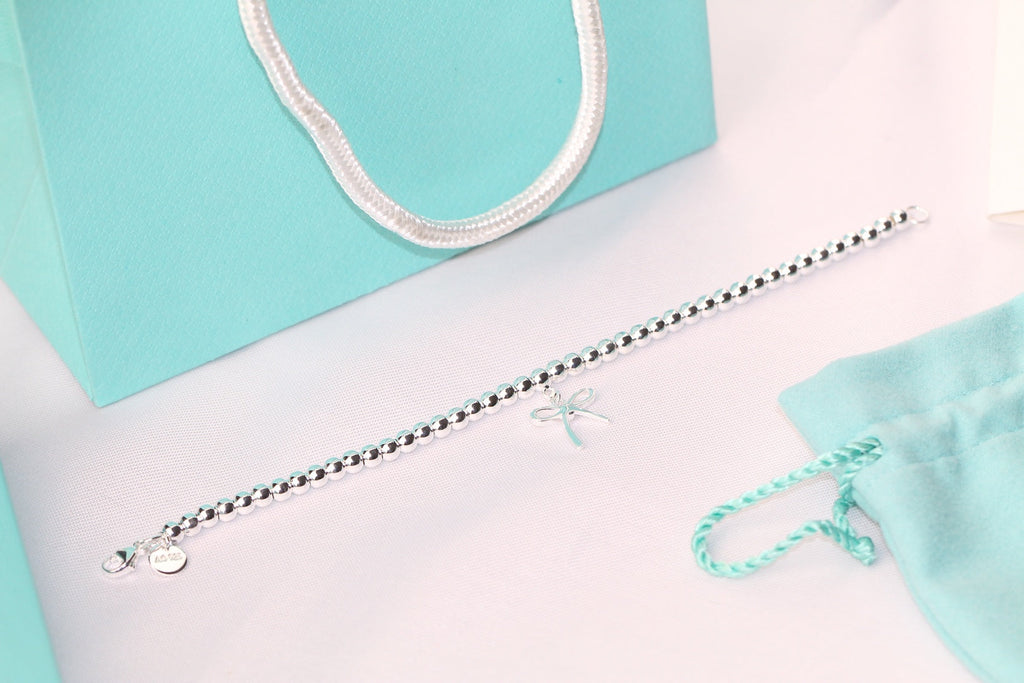 TIFFANY STERLING SILVER BOW BEAD BRACELET