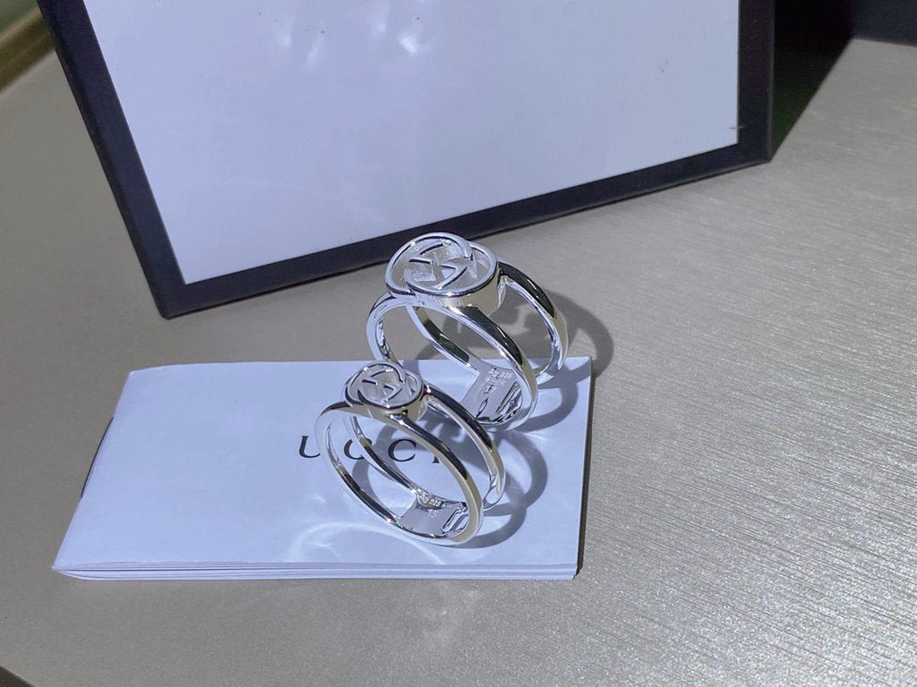 GUCCI RING MIT BREITEM OFFENEM BAND
