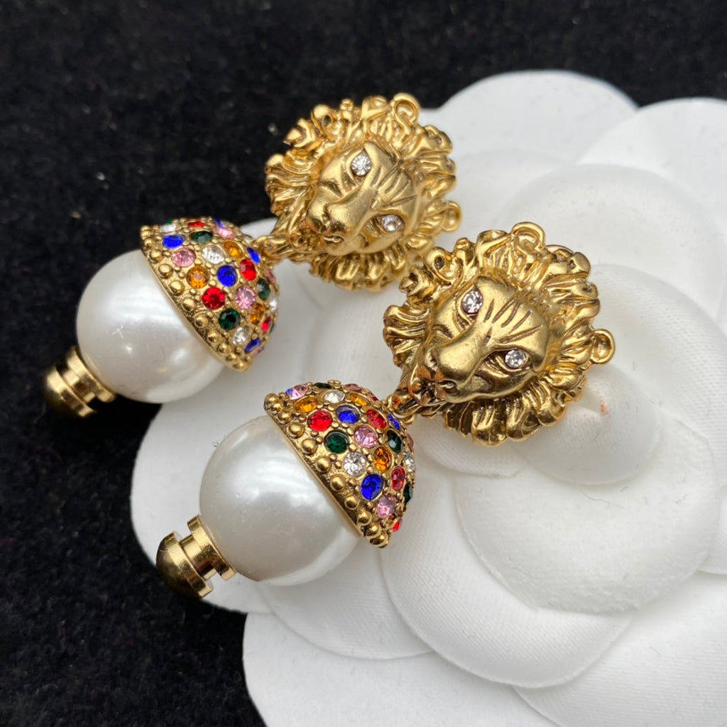 GUCCI LION HEAD PEARL COLORED DIAMOND EARRINGS