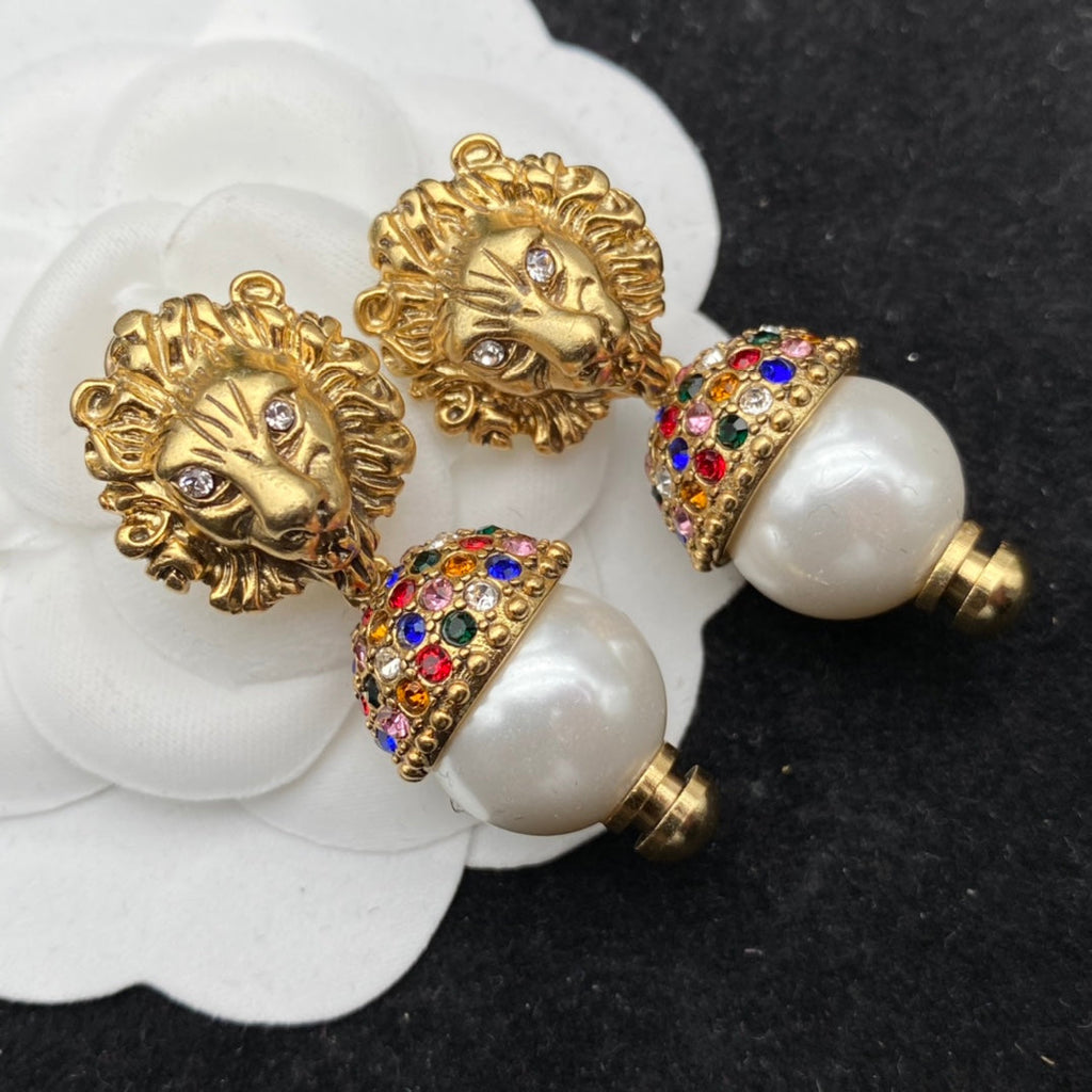 GUCCI LION HEAD PEARL COLORED DIAMOND EARRINGS