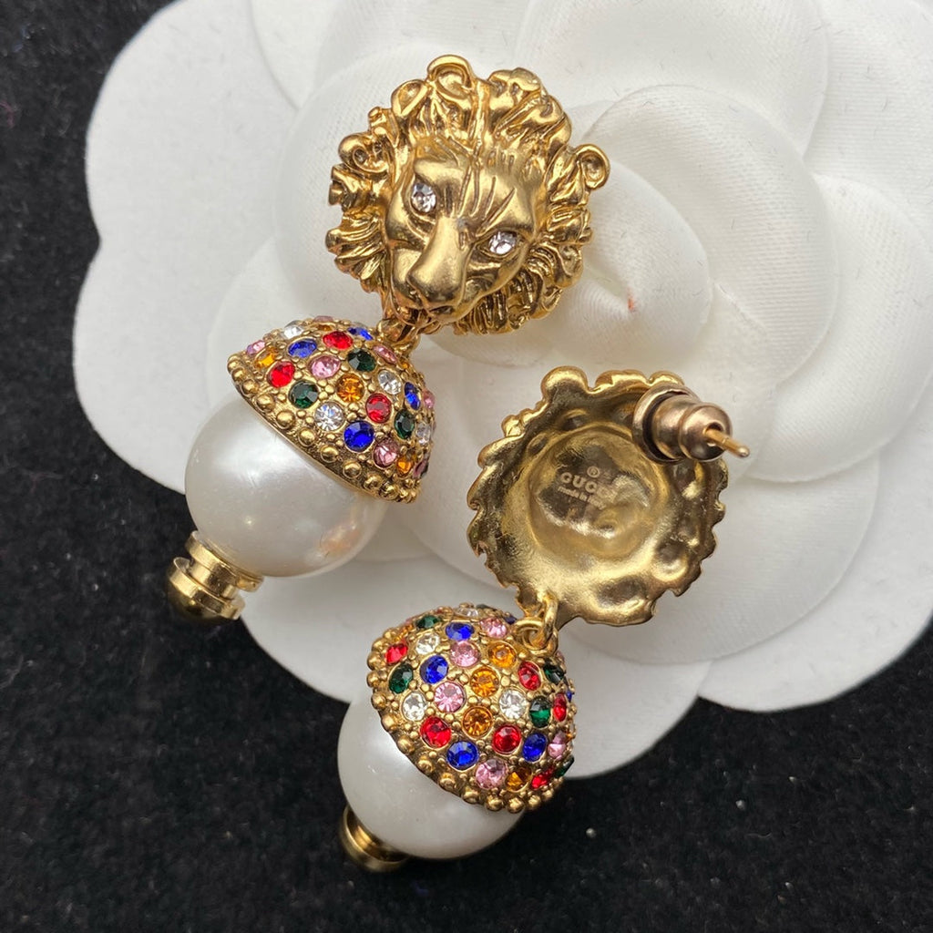 GUCCI LION HEAD PEARL COLORED DIAMOND EARRINGS
