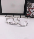 GUCCI SILVER 'BLIND FOR LOVE' BRACELET