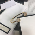 GUCCI GOLD RUNNING DIAMOND LOGO BANGLE BRACELETS