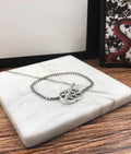 GUCCI STERLING SILVER BRITT DOUBLE G BRACELET