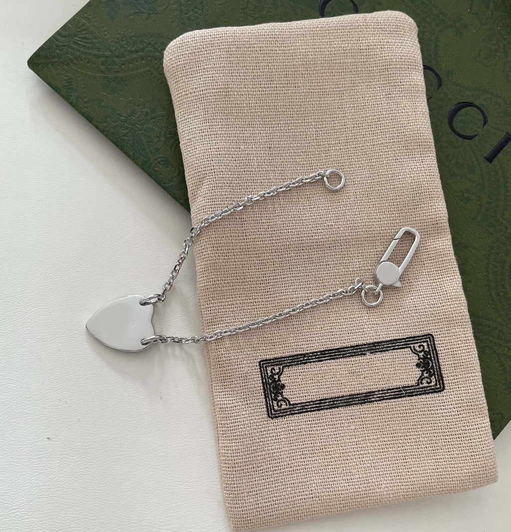 GUCCI LOGO HEART-SHAPED PENDANT SILVER BRACELET
