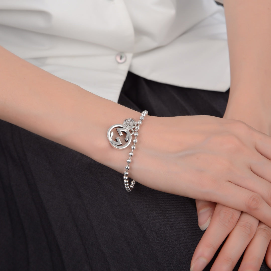 GUCCI BOULE PLATED SILVER CHARM BRACELET
