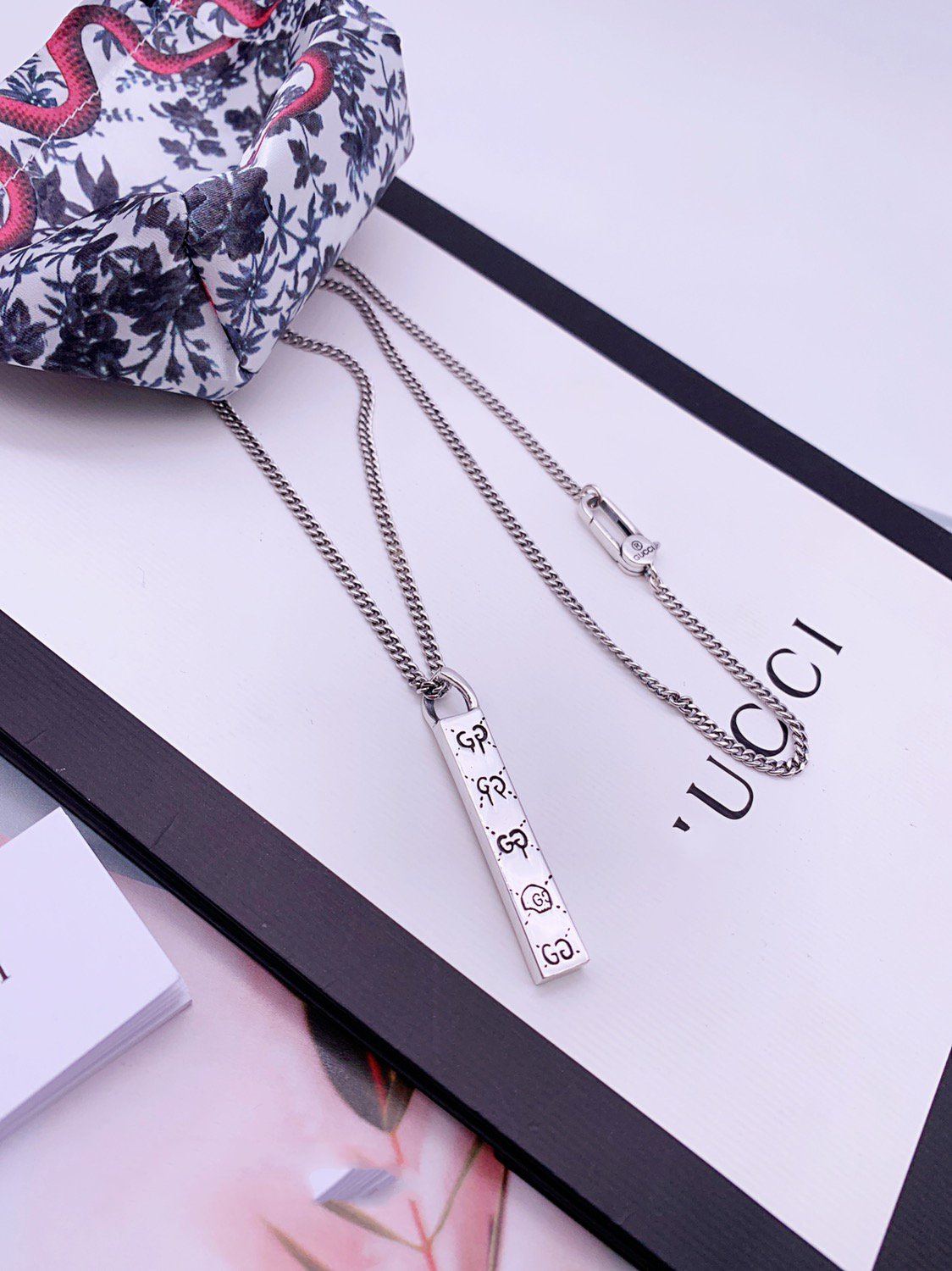 GUCCI STERLING SILVER GHOST BAR PENDANT