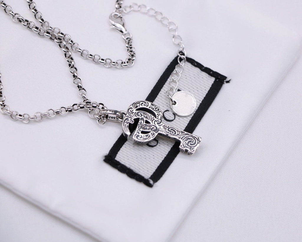 GUCCI SILVER DOUBLE G KEY NECKLACE