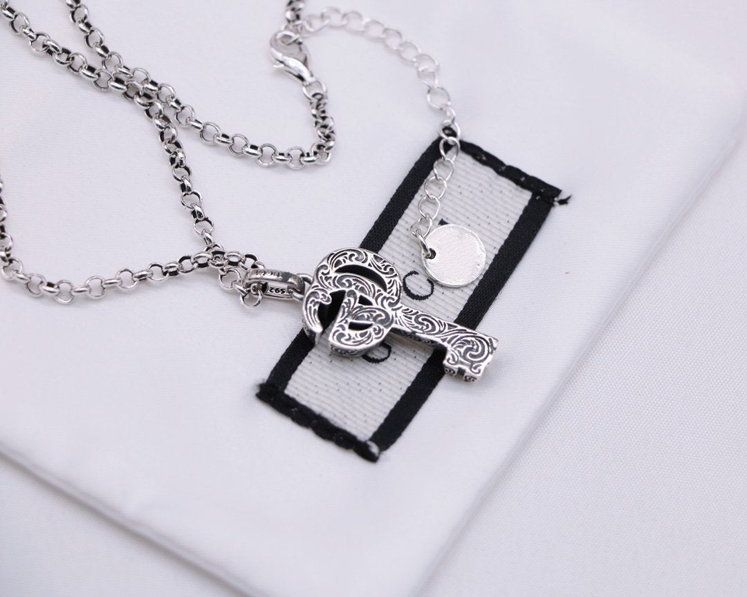 GUCCI SILVER DOUBLE G KEY NECKLACE