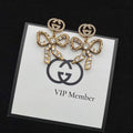 GUCCI BOW EARRINGS GOLD