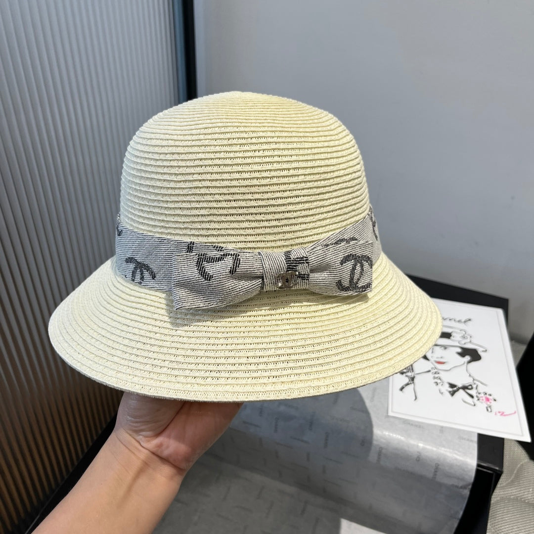 CHANEL STRAW BUCKET HAT IN IVORY WITH RIBBON BOW 673977