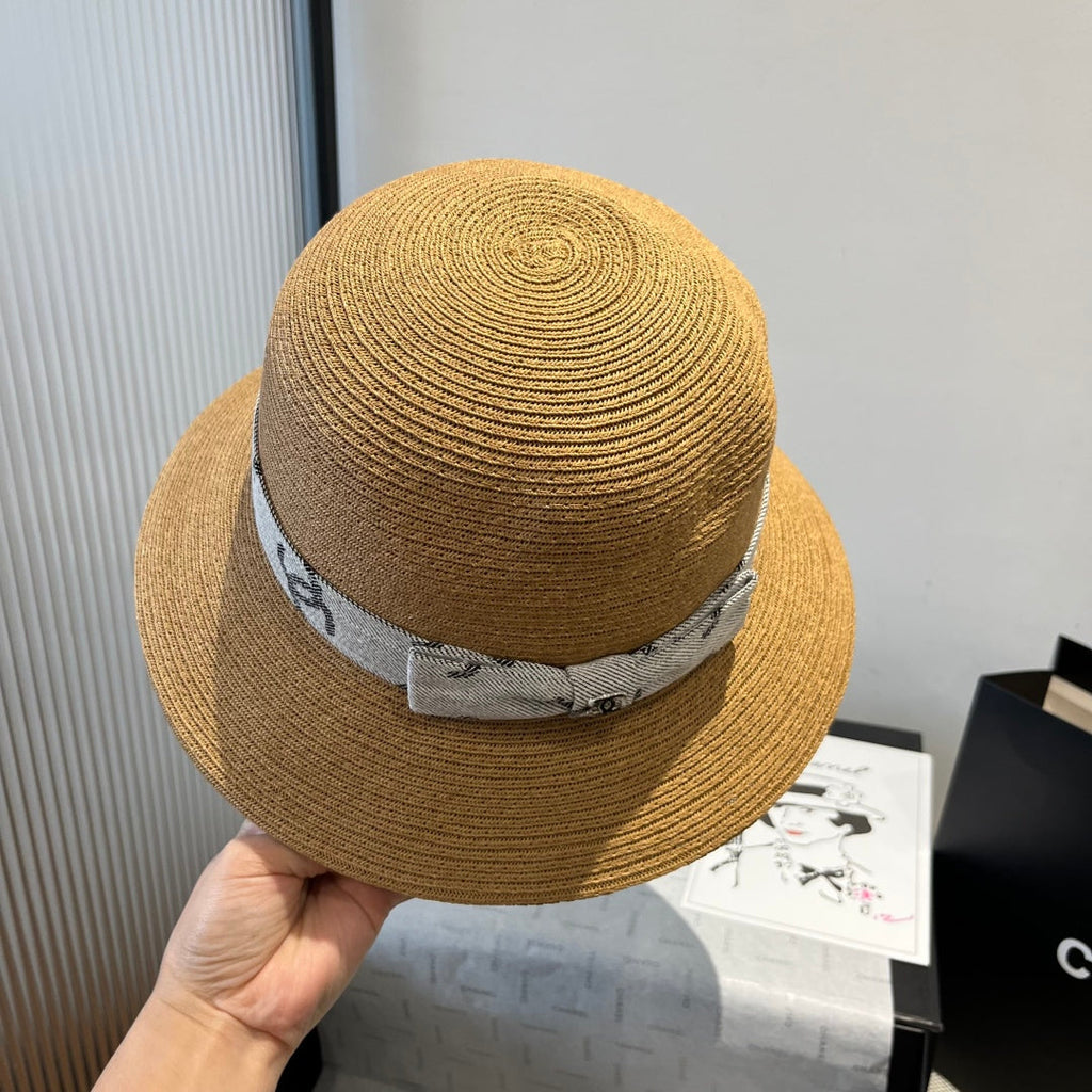 CHANEL STRAW BUCKET HAT IN BROWN WITH RIBBON BOW 673978
