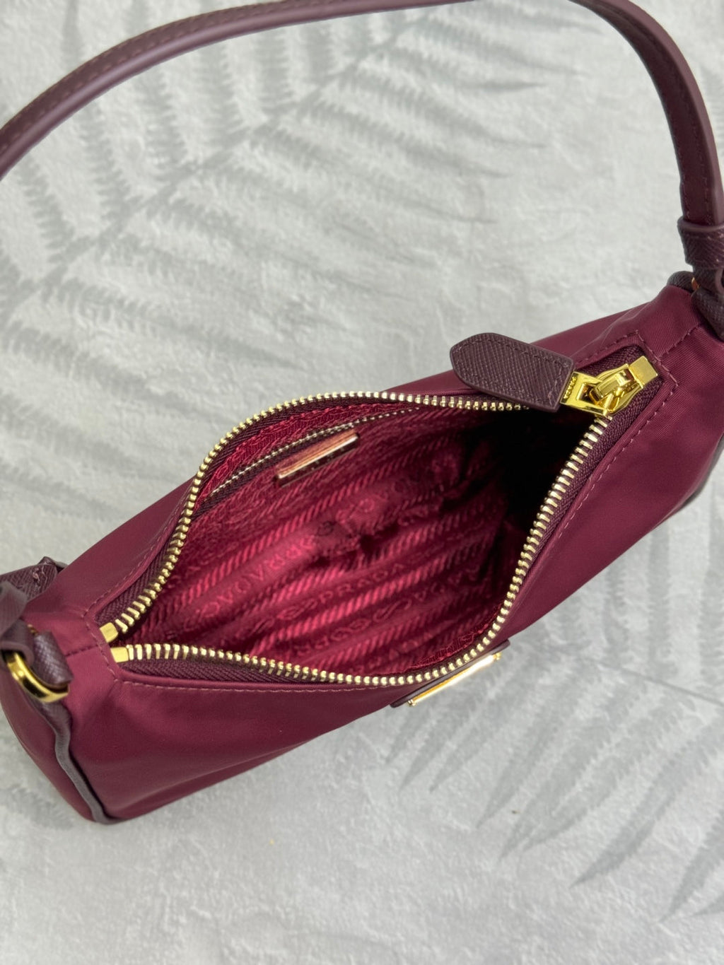 PRADA 25S RE-EDITION 2005 MINI BAG 22 IN BURGUNDY RE-NYLON AND SAFFIANO
