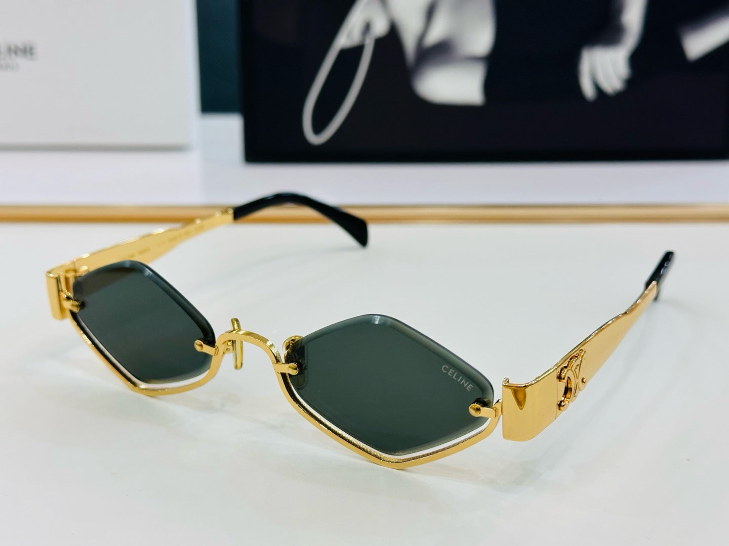 CELINE TRIOMPHE SEMI-RIMLESS SUNGLASS CL42117U IN METAL OCTAGON LENSES