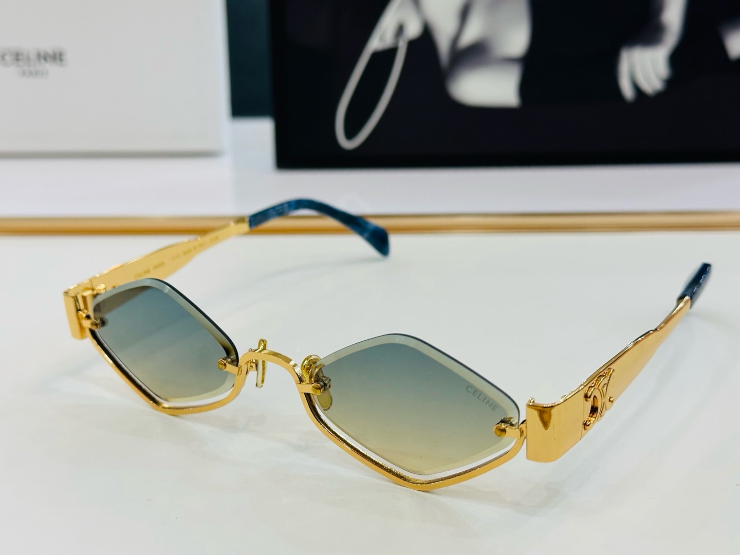 CELINE TRIOMPHE SEMI-RIMLESS SUNGLASS CL42117U IN METAL OCTAGON LENSES
