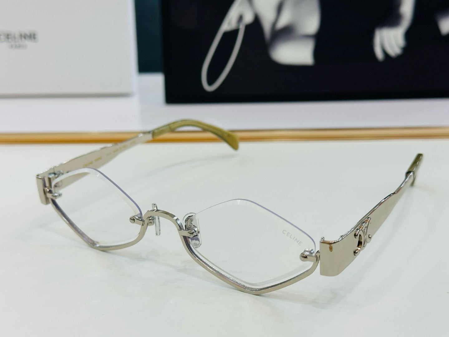 CELINE TRIOMPHE SEMI-RIMLESS SUNGLASS CL42117U IN METAL OCTAGON LENSES
