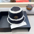 GUCCI BUCKET HAT IN BLACK LAMBSKIN AND WHITE FLEECE 426223