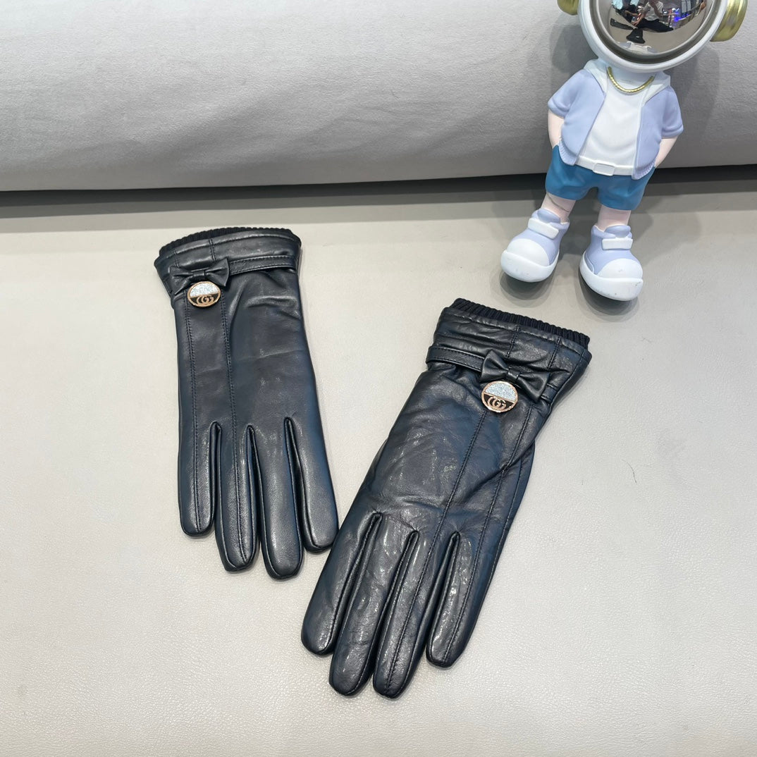 GUCCI GLOVES ATTACHED BOW IN BLACK LAMBSKIN AND WOOL 429202