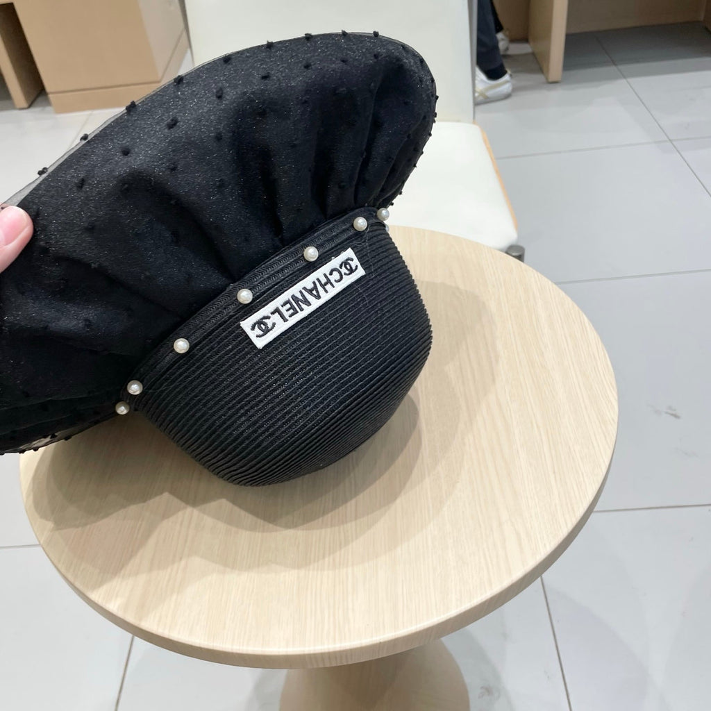 CHANEL WIDE BRIM HAT IN BLACK STRAW 673034