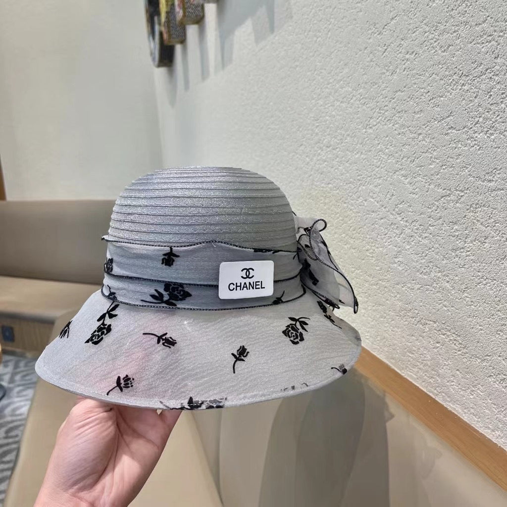 CHANEL STRAW HAT WITH CHIFFON FLOWER VINTAGE GRAY 672759