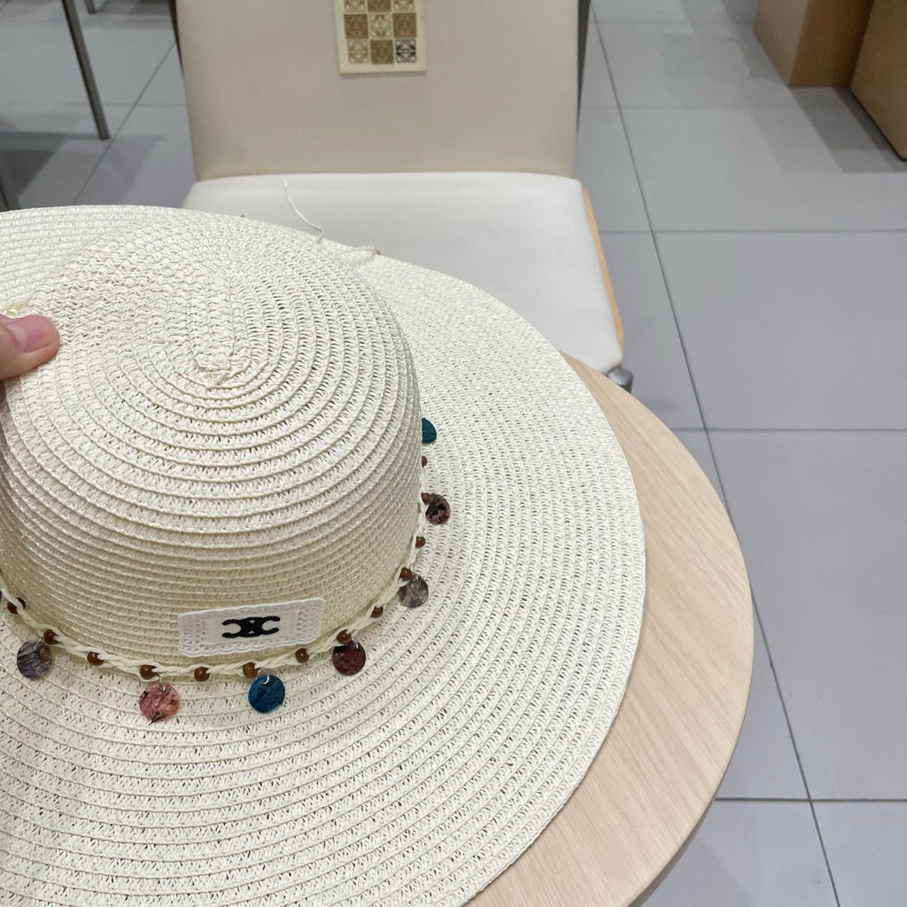 CELINE WIDE BRIM HAT MODEL 652186 IN WHITE WOVEN STRAW