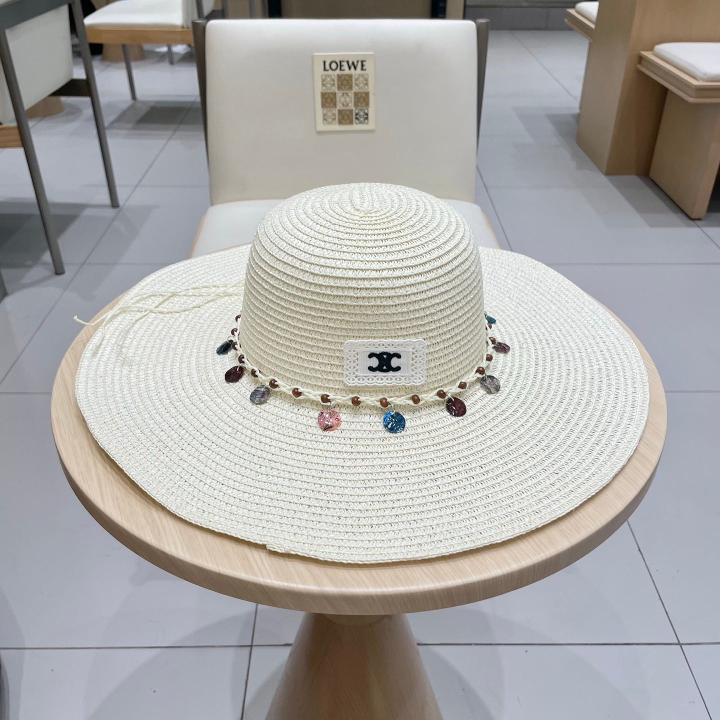 CELINE WIDE BRIM HAT MODEL 652186 IN WHITE WOVEN STRAW